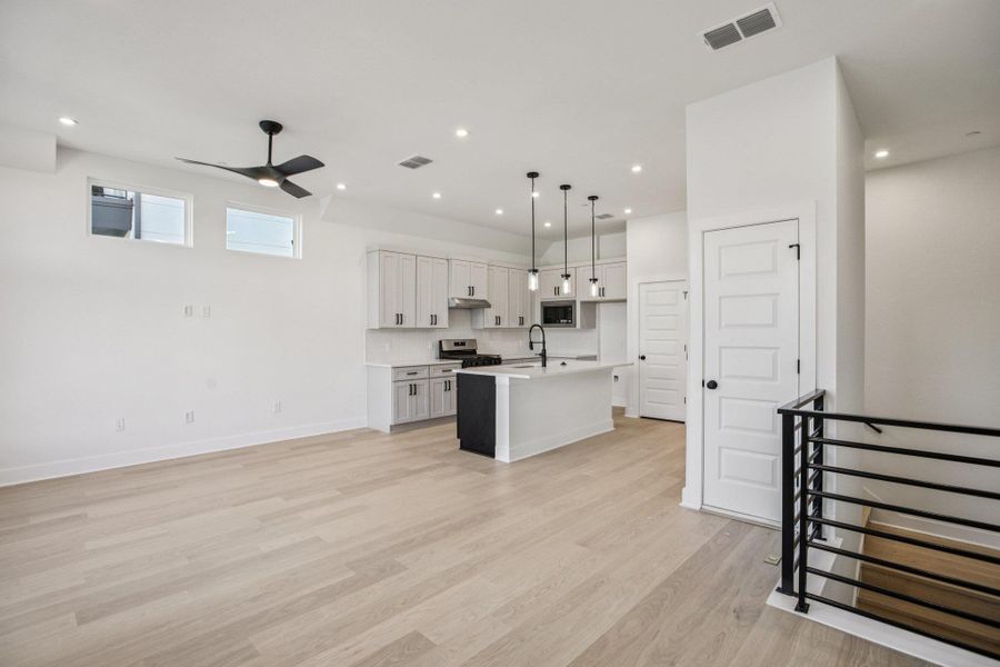 Furnished interior view inside a new home in Koenig Townhomes, Austin (Image 8).