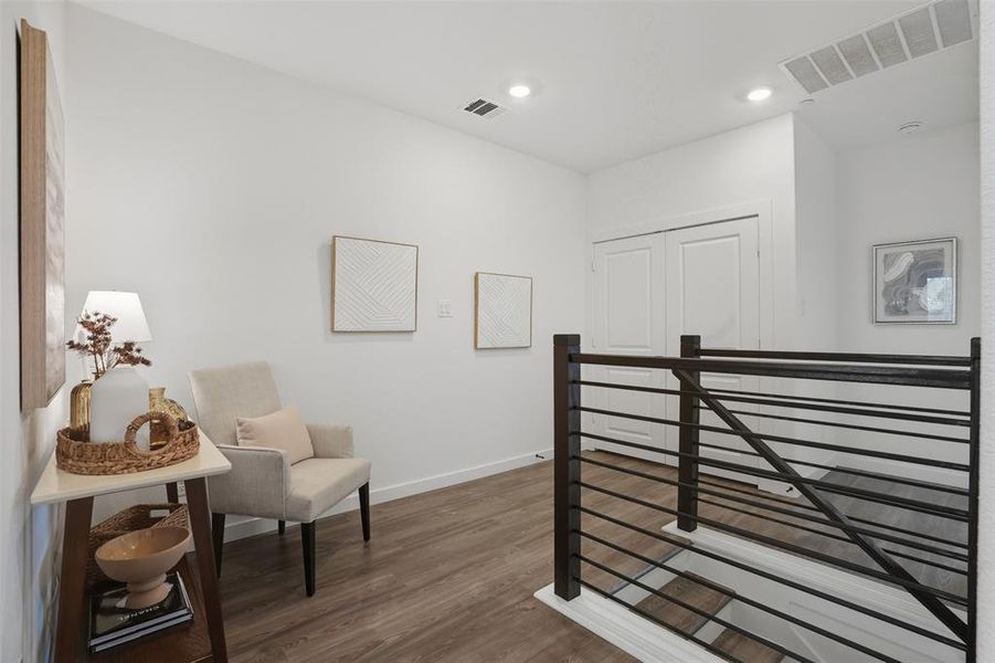 Bedroom with dark wood-style flooring and recessed lighting Bedroom with dark wood-style flooring and recessed lighting