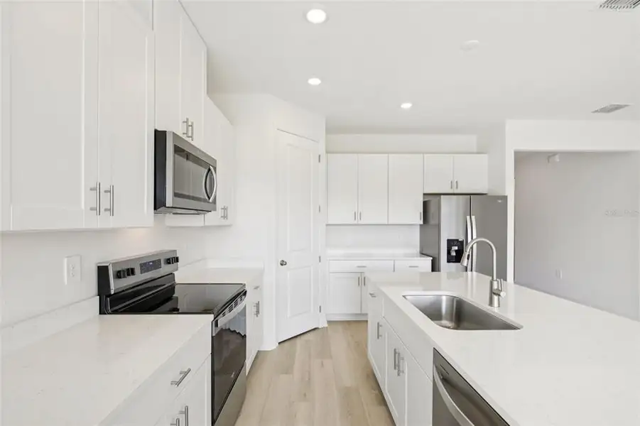 Furnished interior view inside a new home in Coasterra - Reserve Series, Palmetto (Image 11).