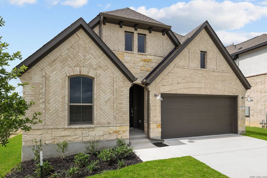 Front exterior of a new home in Nopal Valley, San Antonio, TX, highlighting curb appeal (Image 25). Front exterior of a new home in Nopal Valley, San Antonio, TX, highlighting curb appeal (Image 25).