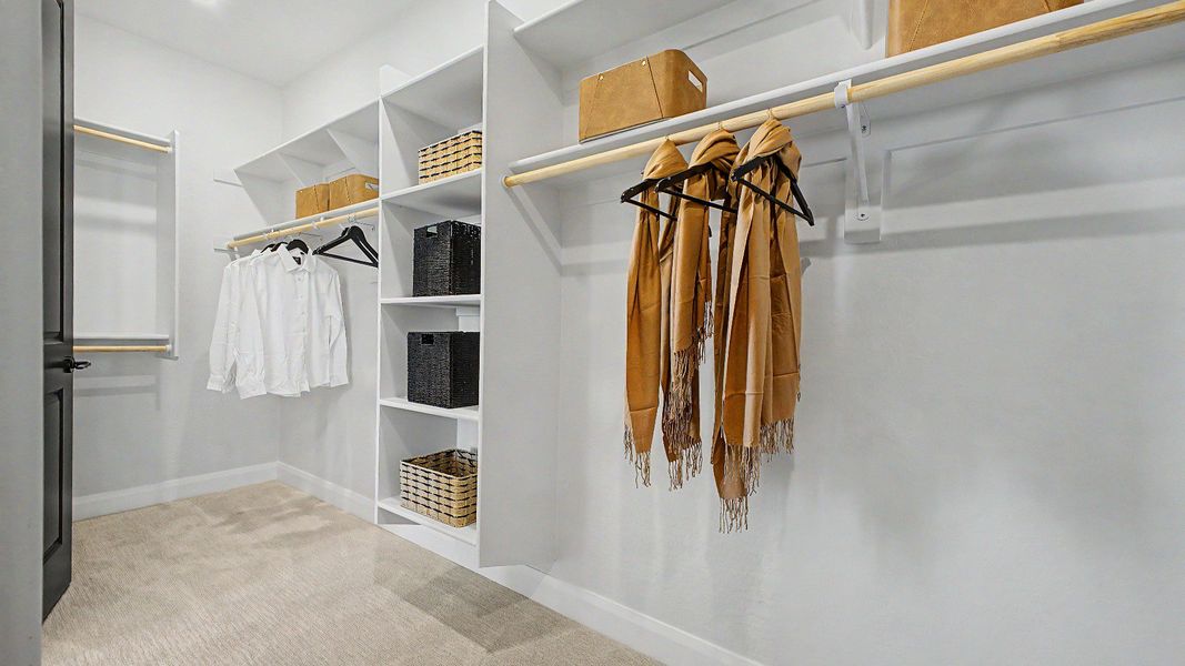 Spacious walk-in primary closet in this quick move-in new home at Saguaro Hills at Vistancia, 32407 N 123rd Dr. Spacious walk-in primary closet in this quick move-in new home at Saguaro Hills at Vistancia, 32407 N 123rd Dr.