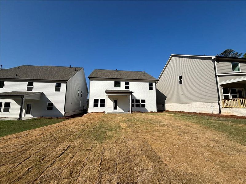 Exterior details and patio area of a home in Arbors at Richland Creek, Buford (Image 3).