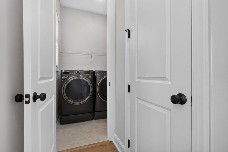 Representative furnished interior of a home built from the The Benton IV by The Providence Group in Ward's Crossing Townhomes, Johns Creek (Image 30).