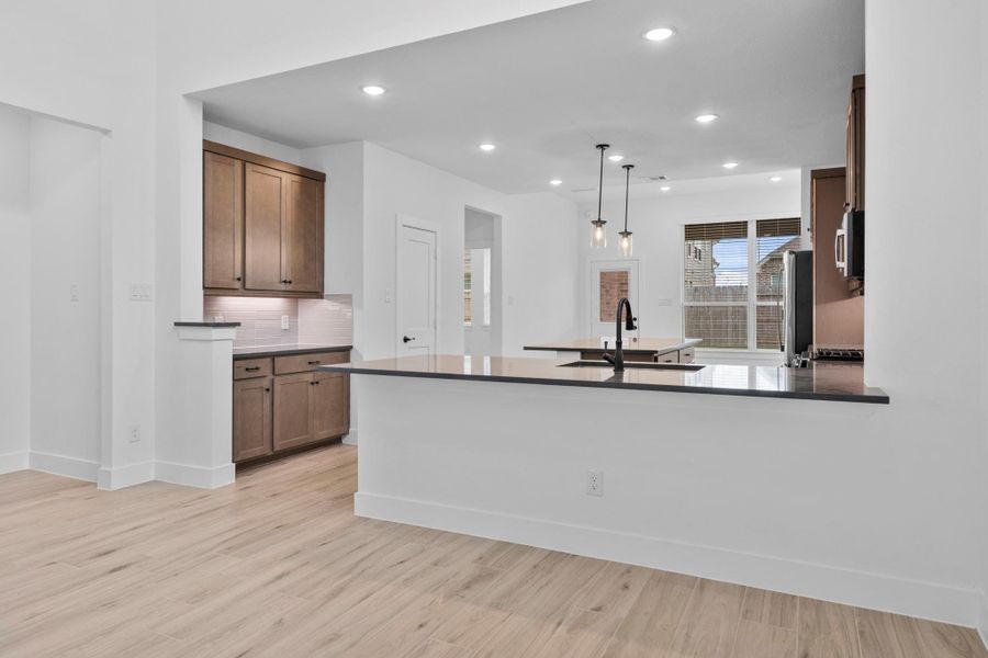 Furnished interior view inside a new home in Wood Leaf Reserve, Tomball (Image 6).