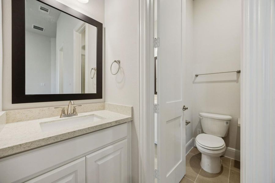 Representative furnished interior of a home built from the Grand Maison III by Grand Homes in Kings Crossing, Parker (Image 10).