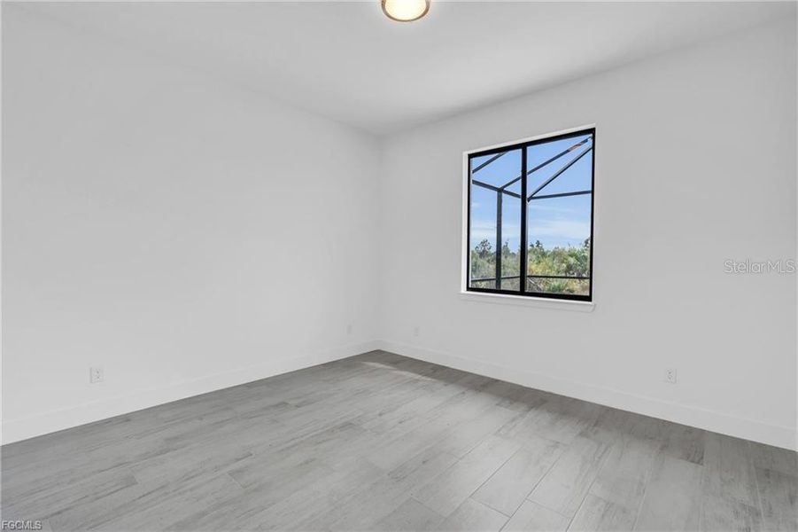 Spacious, unfurnished interior of a new home in , Port Charlotte (Image 30).
