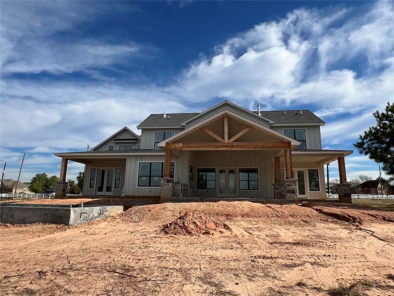 Front exterior of a new home in , Pearland, TX, highlighting curb appeal (Image 7).