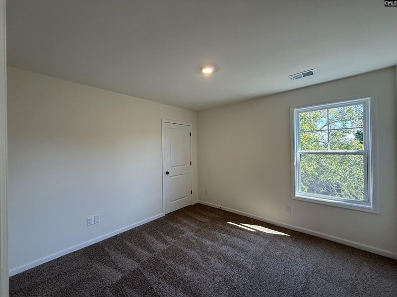 Spacious, unfurnished interior of a new home in Dunbar Village, Cayce (Image 31).