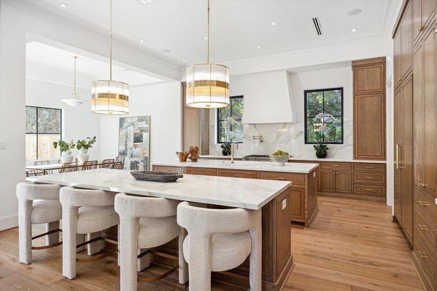 Located just off the kitchen, the nearby breakfast room offers a bright and convenient spot for casual meals. The seamless connection between the two spaces makes family dining and entertaining effortless.