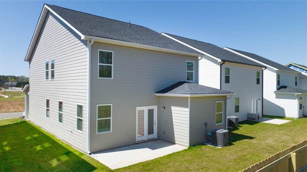 Front exterior of a new home in Shoal Creek, Hampton, GA, highlighting curb appeal (Image 16).