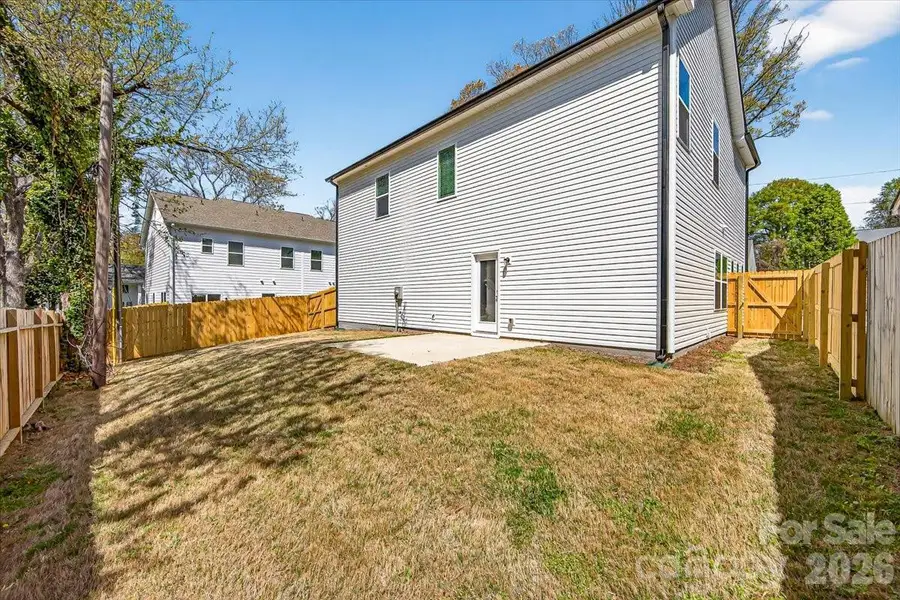 Exterior details and patio area of a home in , Charlotte (Image 26).