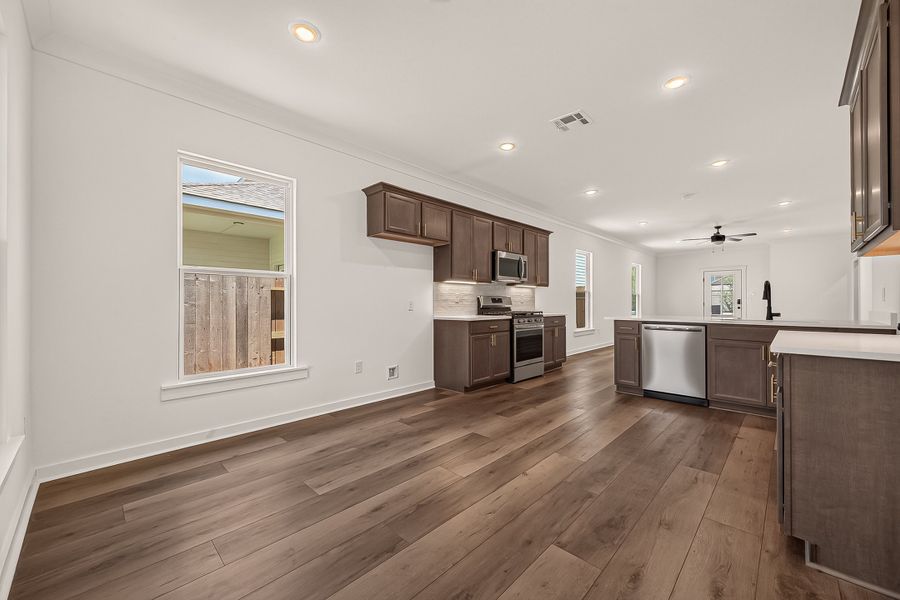 Furnished interior view inside a new home in Aldeana, Bonney (Image 14).