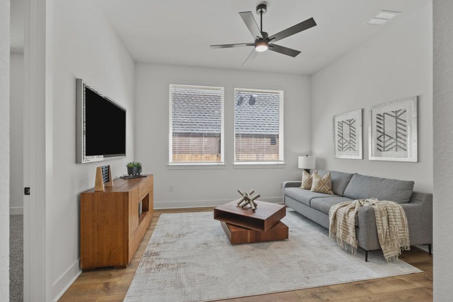 Representative furnished interior of a home built from the Silas by Chesmar Homes in 6 Creeks, Kyle (Image 13).