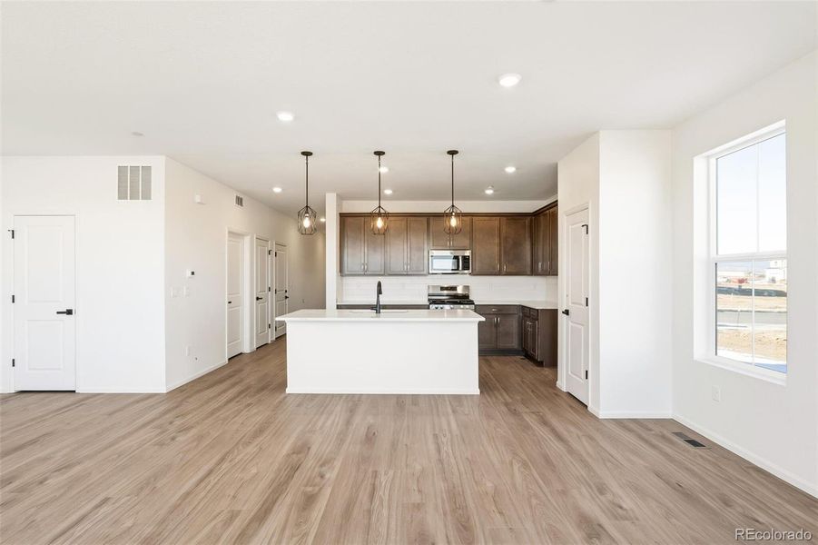 Furnished interior view inside a new home in The Nest Classic at Canyon Creek, Erie (Image 5).