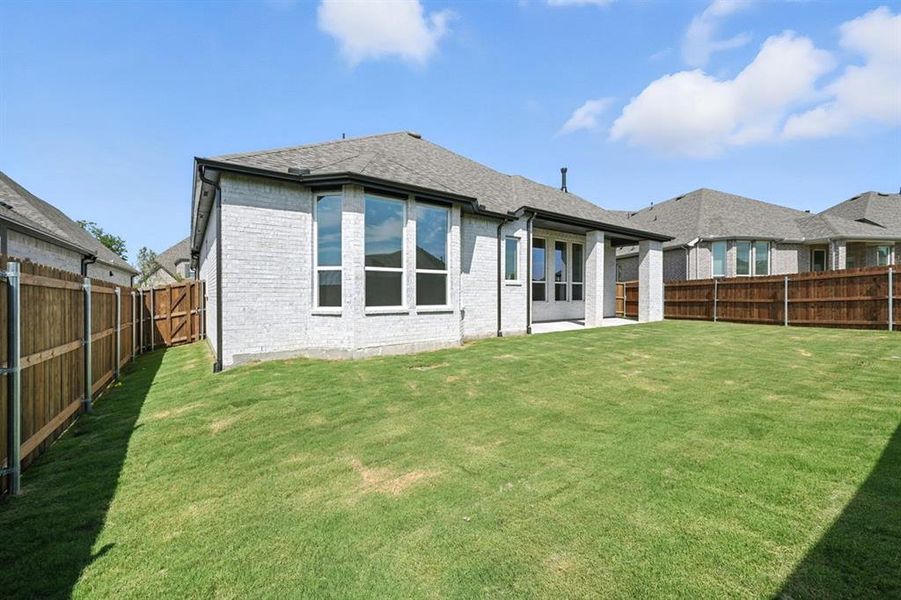 Front exterior of a new home in Thompson Farms: 60ft. lots, Van Alstyne, TX, highlighting curb appeal (Image 23). Front exterior of a new home in Thompson Farms: 60ft. lots, Van Alstyne, TX, highlighting curb appeal (Image 23).