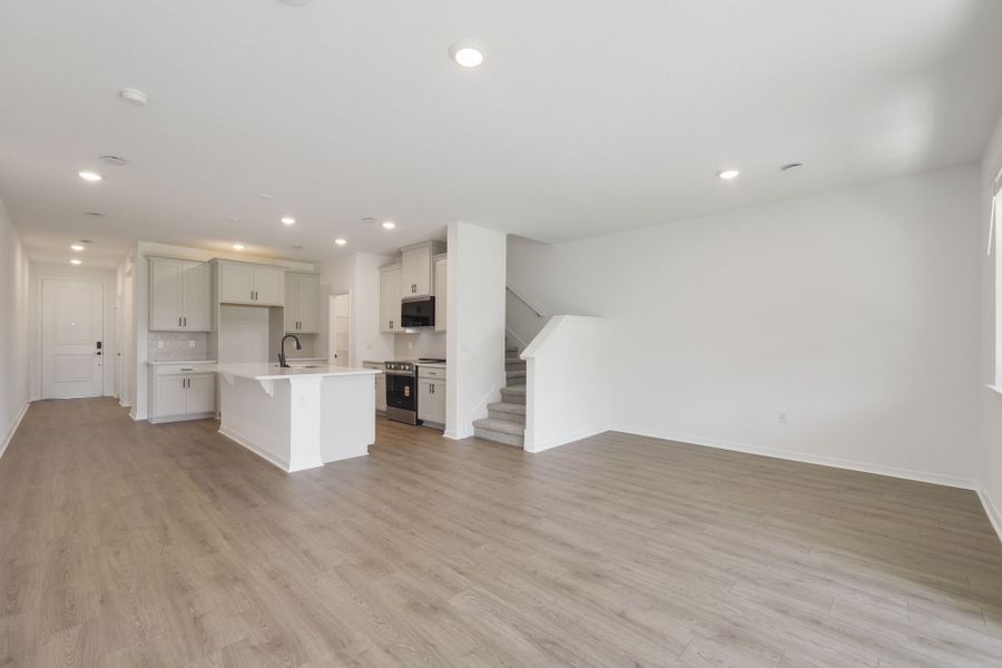 Spacious, unfurnished interior of a new home in Towns at Riverwalk, Sanford (Image 28).