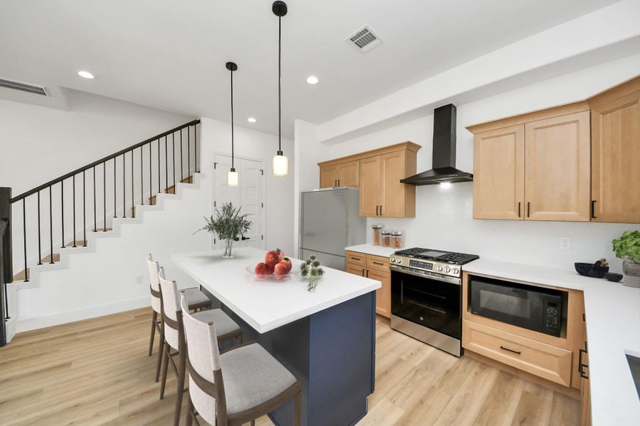 Spacious kitchen offers stainless steel appliances (stove, dishwasher, microwave only) & quartz countertops. Spacious kitchen offers stainless steel appliances (stove, dishwasher, microwave only) & quartz countertops.