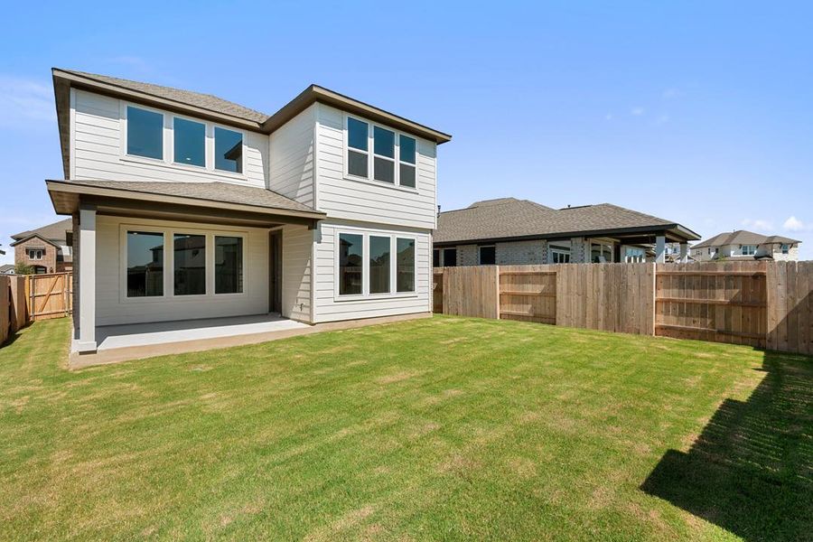 Exterior details and patio area of a home in Terrace Collection at Lariat, Liberty Hill (Image 18). Exterior details and patio area of a home in Terrace Collection at Lariat, Liberty Hill (Image 18).