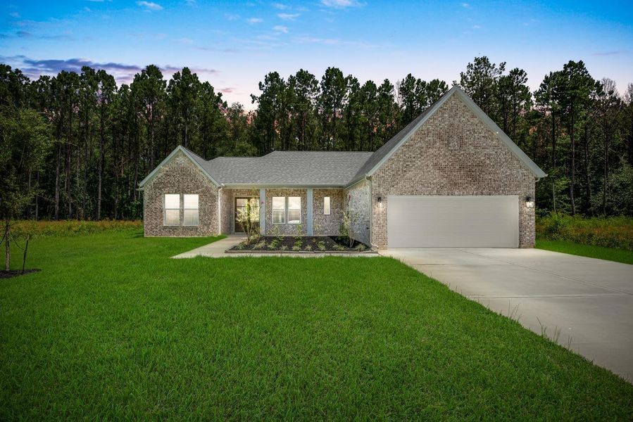 Front exterior of a new home in , Dayton, TX, highlighting curb appeal (Image 1). Front exterior of a new home in , Dayton, TX, highlighting curb appeal (Image 1).