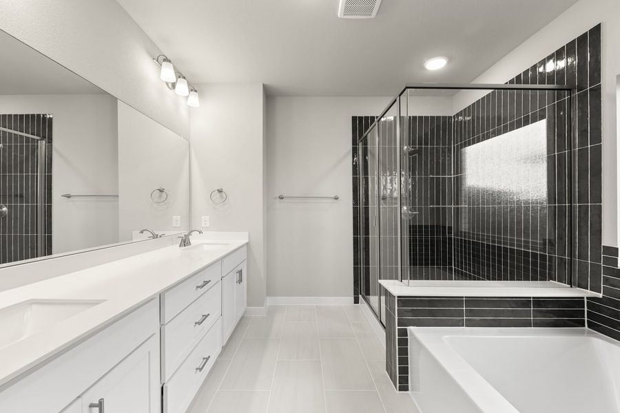 Representative furnished interior of a home built from the Hickory Sunterra 50s by Brohn Homes in Sunterra, Katy (Image 6).