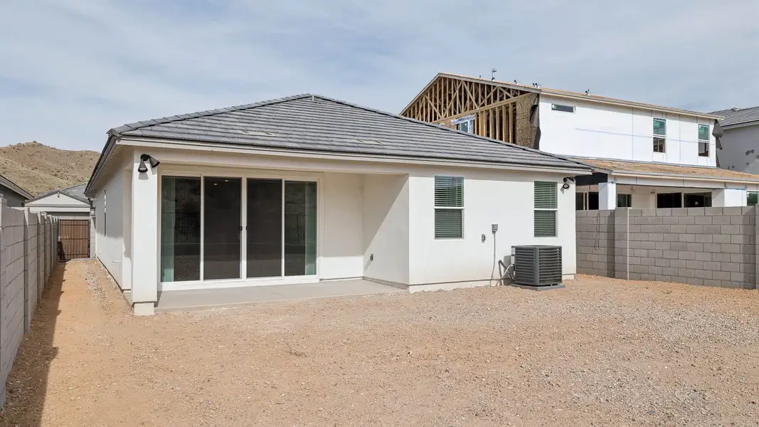 Exterior details and patio area of a home in The Ridge at Stone Butte, Phoenix (Image 2).
