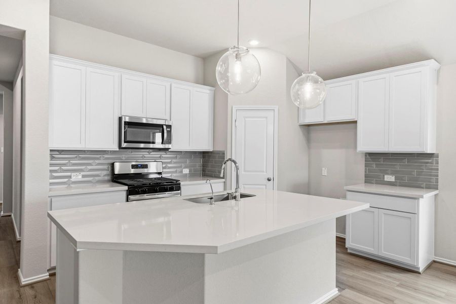 Furnished interior view inside a new home in Bridgeland, Cypress (Image 12).
