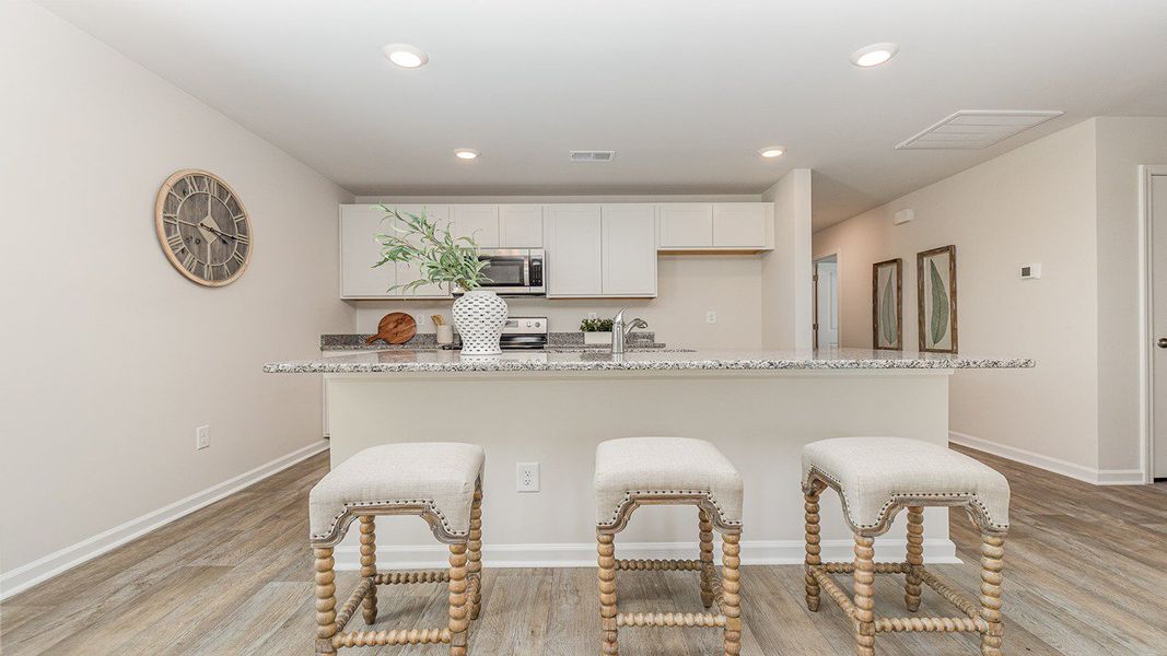 Representative furnished interior of a home built from the DEVON by D.R. Horton in Dove Crossing, Conway (Image 5).