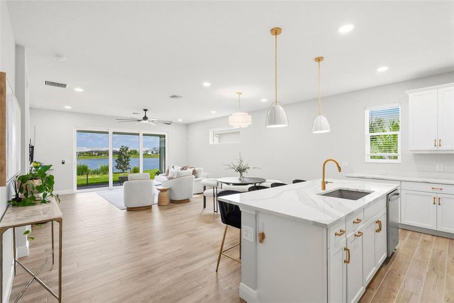 Furnished interior view inside a new home in LakeHouse Cove at Waterside, Sarasota (Image 15). Furnished interior view inside a new home in LakeHouse Cove at Waterside, Sarasota (Image 15).