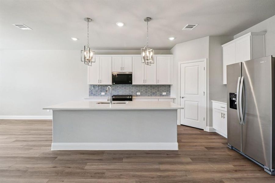 Photo is not of the actual home, but is an inspirational photo of builder’s model home and may depict options, furnishings, and/or decorator features that are not included.