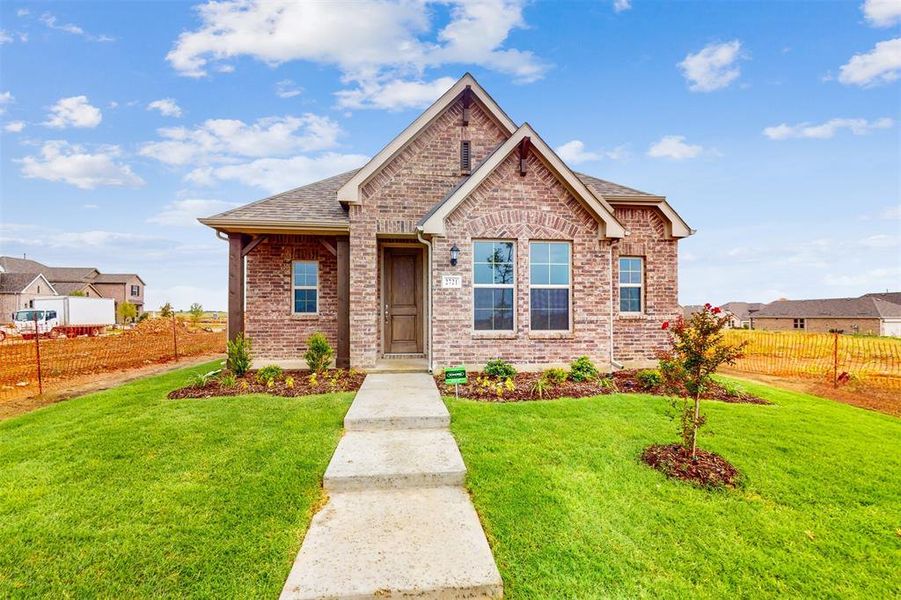 Front exterior of a new home in Lilybrooke at Legacy Hills, Celina, TX, highlighting curb appeal (Image 2). Front exterior of a new home in Lilybrooke at Legacy Hills, Celina, TX, highlighting curb appeal (Image 2).