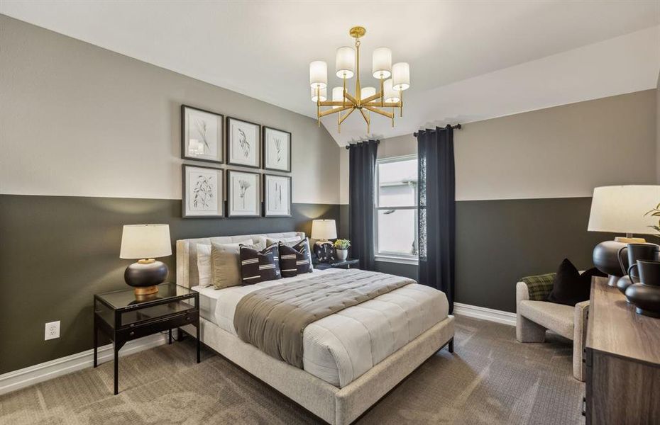 Comfortable secondary bedroom with generous closet space *Model representation