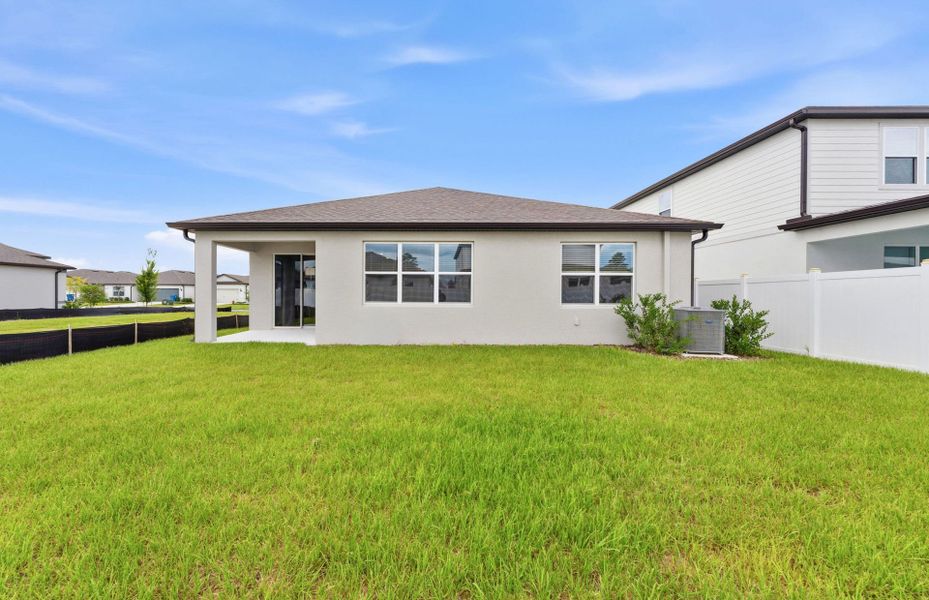 Exterior details and patio area of a home in Caldera, Spring Hill (Image 4).