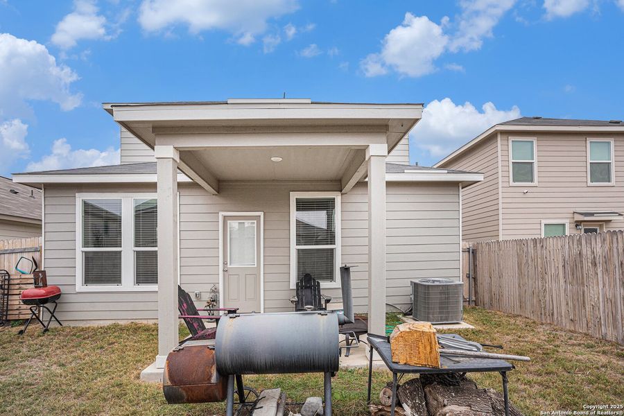 Exterior details and patio area of a home in Medina Crossing, Von Ormy (Image 2).