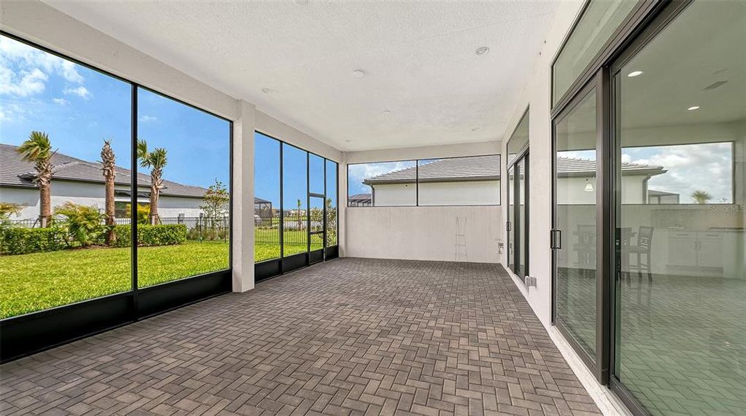 Exterior details and patio area of a home in Artistry Sarasota, Sarasota (Image 31).