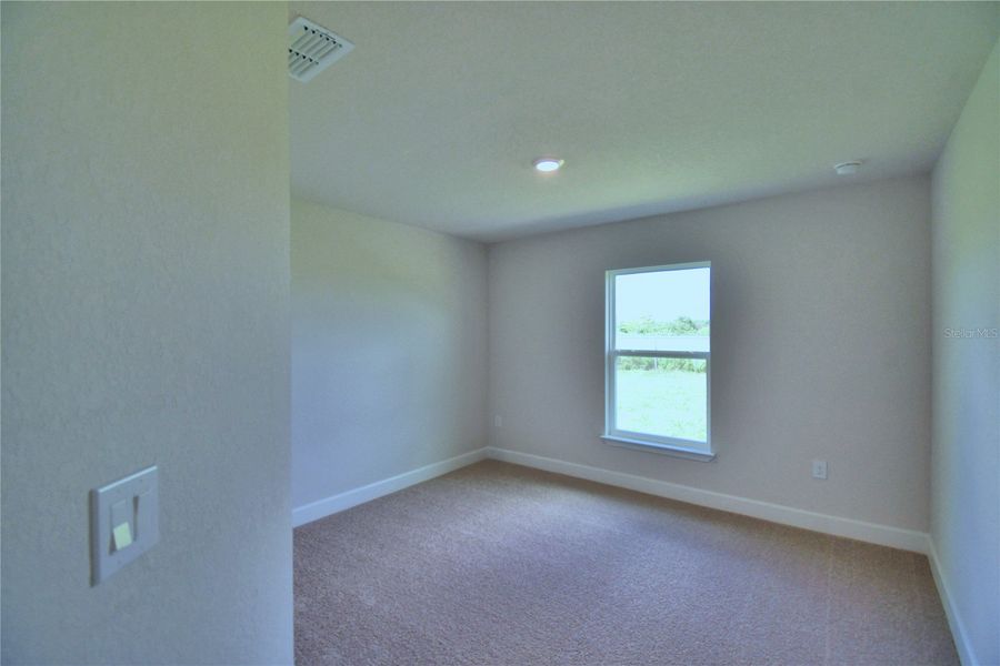 Spacious, unfurnished interior of a new home in Cadence Crossing, Auburndale (Image 26).