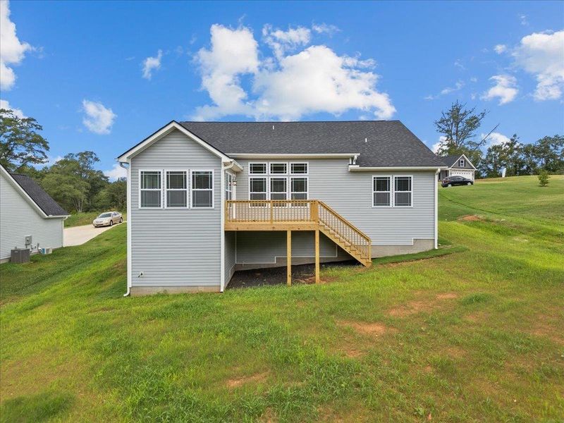 Exterior details and patio area of a home in Fall Creek, Inman (Image 14).