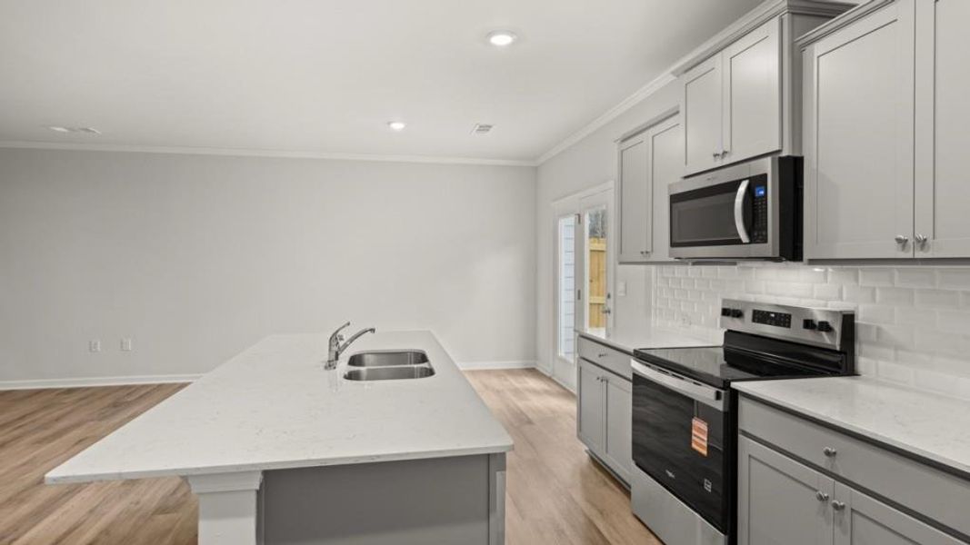Furnished interior view inside a new home in Falcon Landing, Gainesville (Image 8).