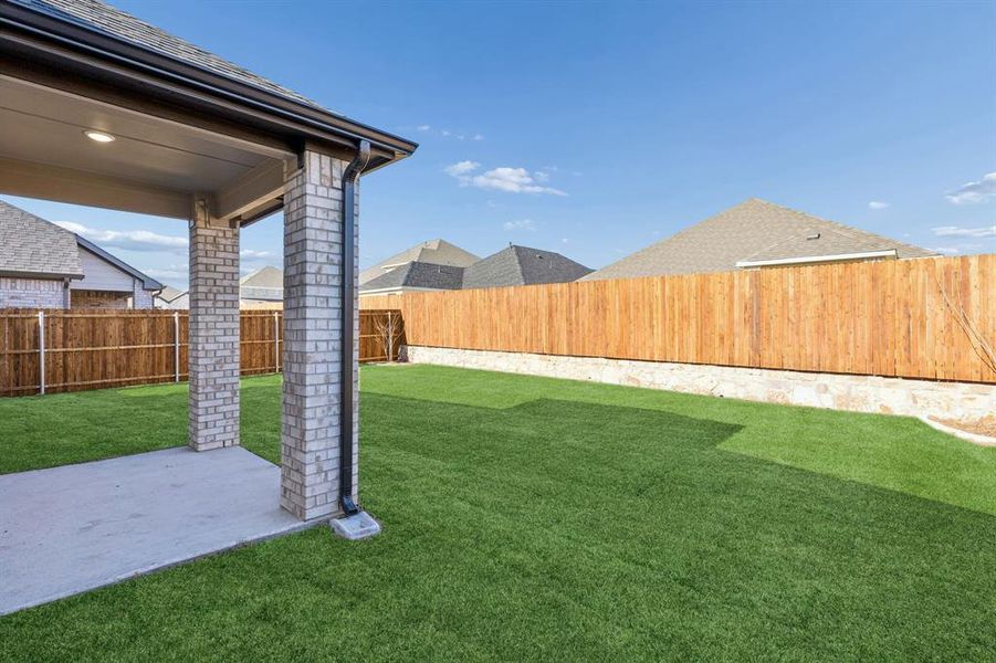 Covered Patio in the Haylee home plan by Trophy Signature Homes - REPRESENTATIVE PHOTO Covered Patio in the Haylee home plan by Trophy Signature Homes - REPRESENTATIVE PHOTO