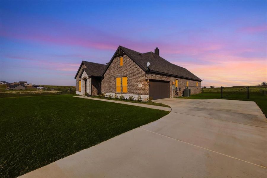 Front exterior of a new home in , Decatur, TX, highlighting curb appeal (Image 26). Front exterior of a new home in , Decatur, TX, highlighting curb appeal (Image 26).
