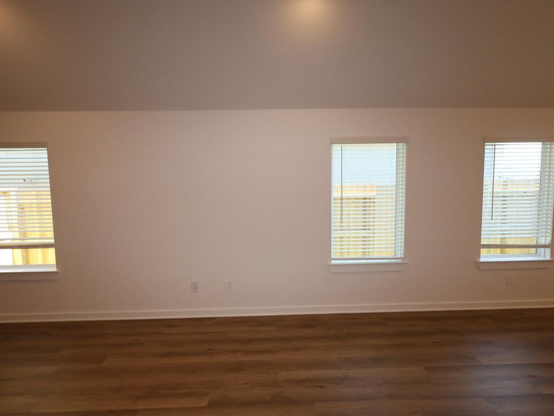 Spacious, unfurnished interior of a new home in Pinewood at Grand Texas, New Caney (Image 5).