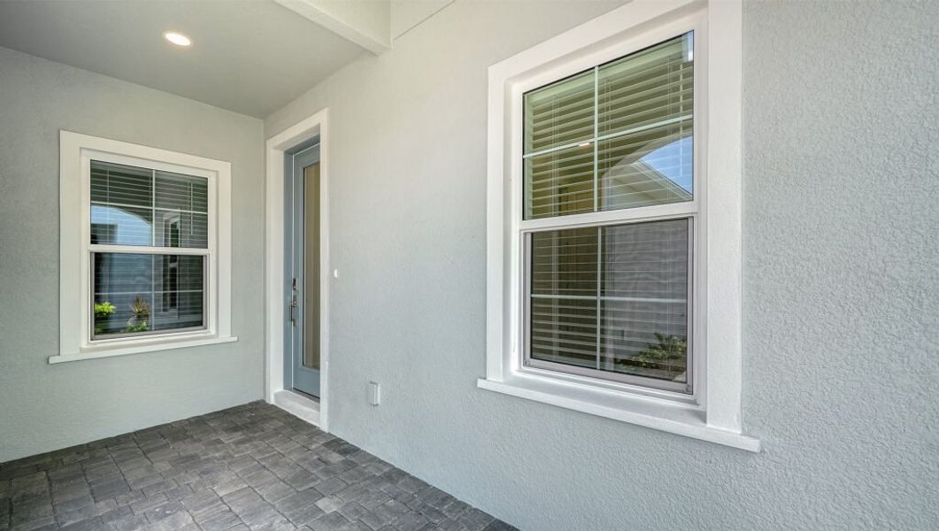 Exterior details and patio area of a home in Windward Real Estate and Homes for Sale in Sarasota, FL - Neal Communities, Lakewood Ranch (Image 22).