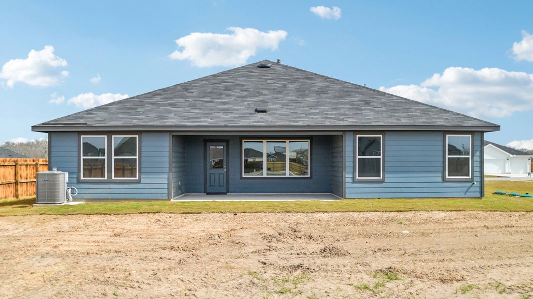 Exterior details and patio area of a home in Railhead, Cedar Creek (Image 18).