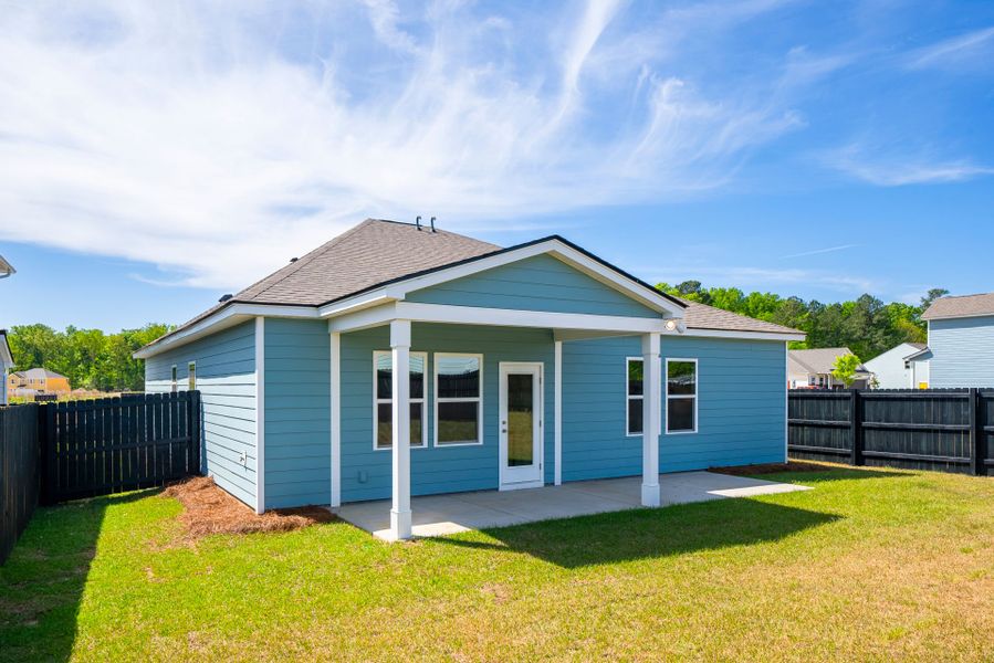 Exterior details and patio area of a home in Monroe Preserve, Chapin (Image 32).