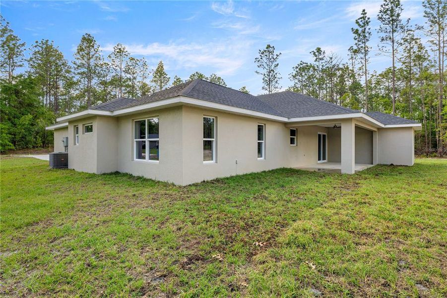 Exterior details and patio area of a home in , Ocala (Image 4).