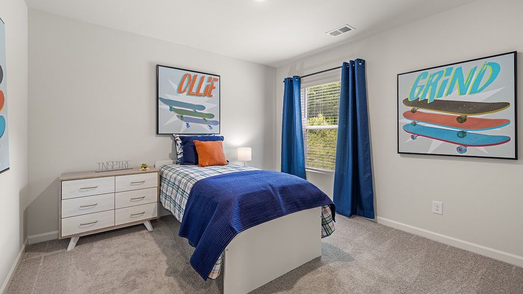 Representative furnished interior of a home built from the ROBIE by D.R. Horton in Pointe Park, Union City (Image 41).