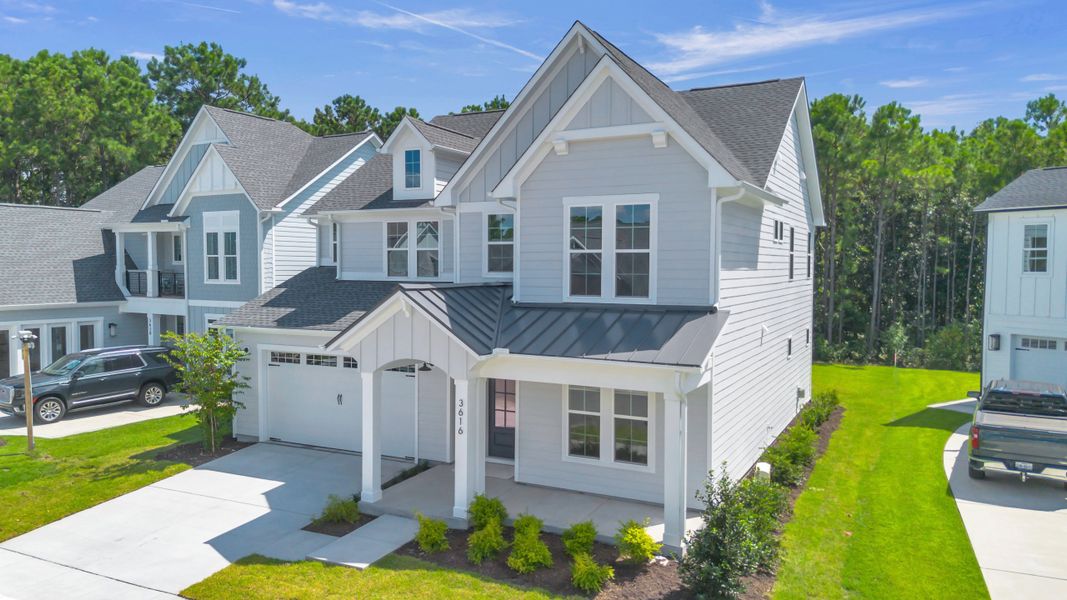 Representative exterior photo of a completed home built from the The Hampton by RobuckHomes in Stonehenge, Raleigh, NC (Image 37).