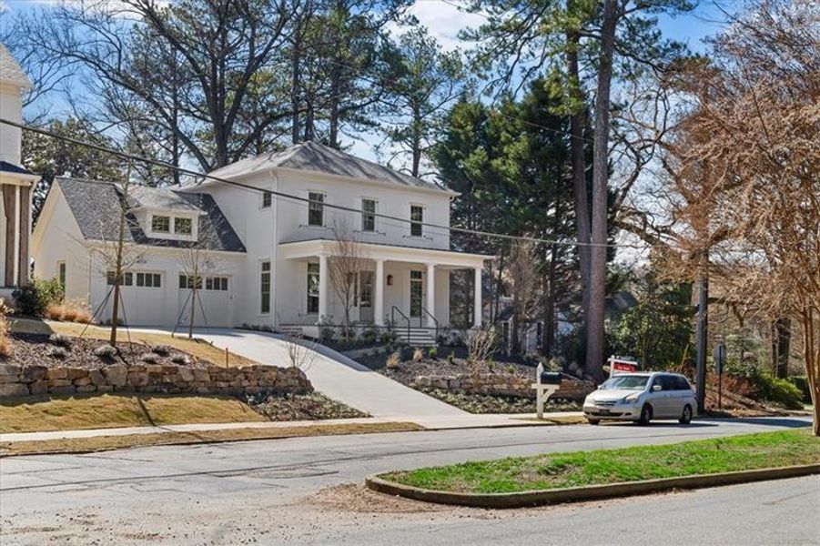 Front exterior of a new home in , Atlanta, GA, highlighting curb appeal (Image 25).