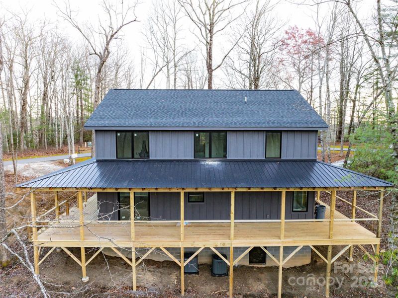 Front exterior of a new home in , Lake Toxaway, NC, highlighting curb appeal (Image 23). Front exterior of a new home in , Lake Toxaway, NC, highlighting curb appeal (Image 23).