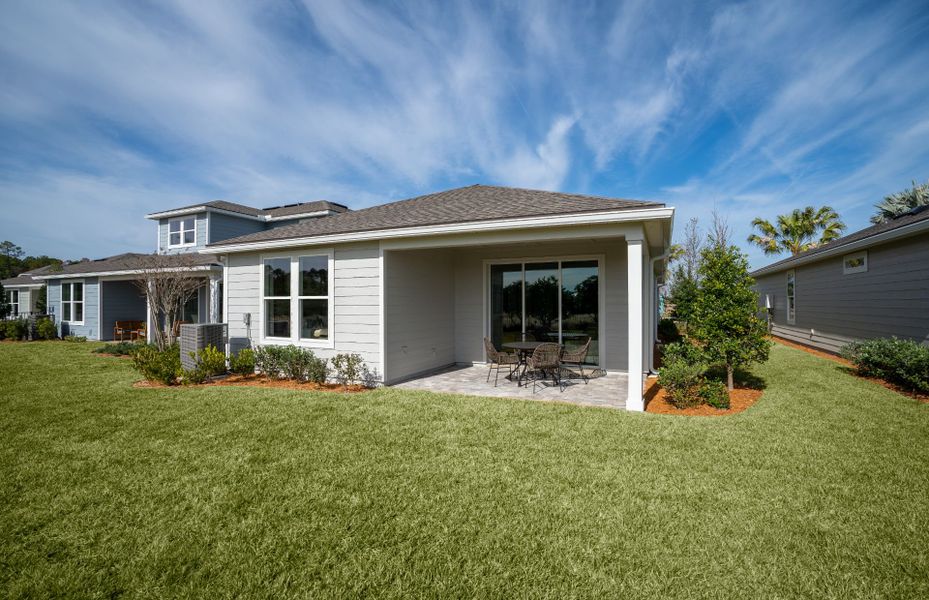 Exterior details and patio area of a home in Del Webb Stone Creek, Ocala (Image 2).