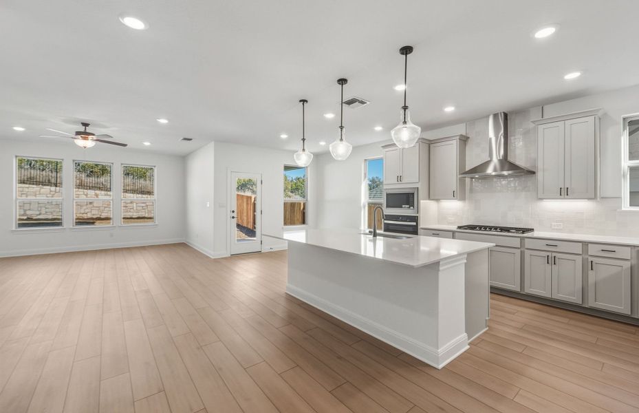 Furnished interior view inside a new home in West Cypress Hills, Spicewood (Image 5).